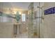 Updated bathroom with a glass shower and decorative tile at 433 N Osprey Ave, Sarasota, FL 34236