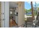View from the exterior looking into the property's kitchen and living room at 433 N Osprey Ave, Sarasota, FL 34236
