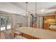 Well-lit kitchen features stainless appliances, stone countertops and access to outdoor living at 433 N Osprey Ave, Sarasota, FL 34236