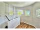 Landing with hardwood floors and multiple windows at 433 N Osprey Ave, Sarasota, FL 34236