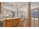 Open floor plan with kitchen island that flows into the living area, blending living and dining at 433 N Osprey Ave, Sarasota, FL 34236