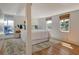 Main bedroom featuring hard wood floors and access to a private patio at 433 N Osprey Ave, Sarasota, FL 34236