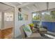 Relaxing porch with wicker chairs, nautical decor, and shaded seating area at 433 N Osprey Ave, Sarasota, FL 34236