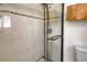 Modern shower with glass door and tile surround at 433 N Osprey Ave, Sarasota, FL 34236