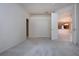 This bedroom is bright and spacious and features a large closet and carpet at 4341 Callista Ln, Sarasota, FL 34243