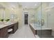Bright bathroom with dual sinks, and a soaking tub at 4607 5Th Ne Ave, Bradenton, FL 34208