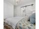 Cozy bedroom with decorative quilt, sliding door to closet, and bright natural light at 4607 5Th Ne Ave, Bradenton, FL 34208