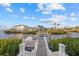 Private dock on the canal, providing direct access to the water and stunning views of neighboring properties at 4607 5Th Ne Ave, Bradenton, FL 34208