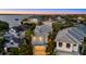 Charming two-story home with a gray roof and light blue shutters nestled in a neighborhood at 4607 5Th Ne Ave, Bradenton, FL 34208