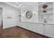 Bright living room features built in shelving at 4607 5Th Ne Ave, Bradenton, FL 34208
