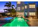 Backyard pool and spa with open-air dining and access to the home's patio at 4607 5Th Ne Ave, Bradenton, FL 34208