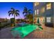 Backyard pool and spa with open-air dining and access to the home's patio at 4607 5Th Ne Ave, Bradenton, FL 34208