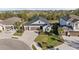 Charming single-story home with a two-car garage, well-kept lawn, and colorful front garden at 4611 Los Robles Ct, Palmetto, FL 34221