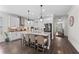 Spacious kitchen featuring a central island, pendant lighting, and stainless steel appliances at 4611 Los Robles Ct, Palmetto, FL 34221
