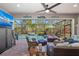 Charming outdoor space boasting a screened-in pool area with ample seating and a relaxing ambiance at 4611 Los Robles Ct, Palmetto, FL 34221