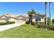 Attractive home with a manicured lawn, complemented by mature trees and meticulously maintained landscaping at 4629 Samoset Dr, Sarasota, FL 34241