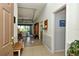 Inviting foyer with tile flooring that opens to a living area, providing a glimpse of the spacious interior at 4629 Samoset Dr, Sarasota, FL 34241