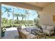 Inviting screened-in patio with comfortable seating and views of the landscaped backyard at 4629 Samoset Dr, Sarasota, FL 34241