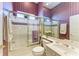 Bright bathroom featuring a combined shower and bathtub with a striped privacy glass at 5224 88Th E St, Bradenton, FL 34211