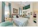 This bedroom offers natural light and features neutral walls and carpet at 5224 88Th E St, Bradenton, FL 34211