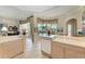 Open kitchen area with a sink, natural light, and an adjacent living space at 5224 88Th E St, Bradenton, FL 34211