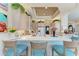 Well-lit kitchen bar featuring overhead lighting and views to another room at 5224 88Th E St, Bradenton, FL 34211