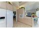 Bright kitchen featuring a built-in oven and ample counter space at 5224 88Th E St, Bradenton, FL 34211