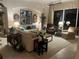 Comfortable living room highlighted by stylish decor, plush seating, and serene ambiance at 5224 88Th E St, Bradenton, FL 34211