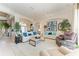 Spacious living room featuring elegant furnishings, neutral tones, and abundant natural light at 5224 88Th E St, Bradenton, FL 34211