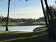 Scenic view of a pond surrounded by a golf course, showcasing the tranquil beauty of the natural landscape at 5224 88Th E St, Bradenton, FL 34211