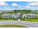 Beautiful community clubhouse with lush landscaping and a welcoming entrance for residents and their guests at 5631 Silver Moonlight Dr, Palmetto, FL 34221