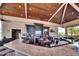 Full wet bar with granite counters, wood ceilings, liquor storage, TVs and seating available in community center at 5685 Palmer Cir # 202, Bradenton, FL 34211