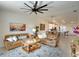 Comfortable living room with leather sofas, stylish decor, and an open layout connecting to the kitchen area at 5685 Palmer Cir # 202, Bradenton, FL 34211