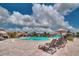 Resort-style pool with fountains and ample seating, perfect for a relaxing day under the sun at 5685 Palmer Cir # 202, Bradenton, FL 34211