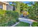 Inviting backyard sitting area with comfortable chairs, perfect for relaxing and enjoying the outdoors at 6600 Horned Owl Pl, Sarasota, FL 34241