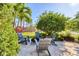 Cozy backyard fire pit surrounded by chairs, creating a relaxing outdoor gathering space at 6600 Horned Owl Pl, Sarasota, FL 34241
