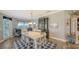 Charming dining area featuring a large table, cozy seating, and elegant decor for Gathering gatherings at 7910 34Th W Ave # 203, Bradenton, FL 34209
