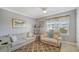 Cozy living room with comfortable seating, a plush rug, and a bright window, perfect for relaxation at 7910 34Th W Ave # 203, Bradenton, FL 34209