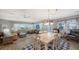 Inviting open concept living and dining area filled with natural light and stylish furnishings at 7910 34Th W Ave # 203, Bradenton, FL 34209