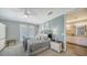 Serene main bedroom with a full ensuite bath featuring a double sink vanity and a coordinated color palette at 7910 34Th W Ave # 203, Bradenton, FL 34209