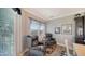 Cozy sitting area with comfortable armchairs, natural light, and stylish decor, perfect for relaxation at 7910 34Th W Ave # 203, Bradenton, FL 34209
