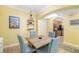 Bright dining area with skylight and view to the kitchen at 808 3Rd W Ave # 205, Bradenton, FL 34205