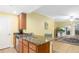 Well-lit kitchen featuring granite countertops, a breakfast bar, and stainless steel appliances at 808 3Rd W Ave # 205, Bradenton, FL 34205