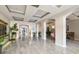 Spacious lobby featuring tile floors, recessed lighting, and decorative plants at 808 3Rd W Ave # 205, Bradenton, FL 34205