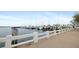 This image shows the marina with several boats and yachts docked along the waterfront at 808 3Rd W Ave # 205, Bradenton, FL 34205