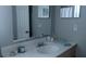 Well-lit bathroom with a neutral color palette and a clean, modern aesthetic at 820 Coconut Rd, Venice, FL 34293
