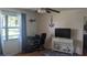 This bedroom features a desk and television at 820 Coconut Rd, Venice, FL 34293