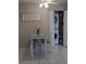 Cozy dining area with a modern table, chairs, and in-unit washer and dryer at 820 Coconut Rd, Venice, FL 34293