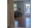 Entryway with wood floors and a view to the outside at 820 Coconut Rd, Venice, FL 34293