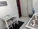 Charming eat-in kitchen nook with white marble top table and white tile flooring at 820 Coconut Rd, Venice, FL 34293